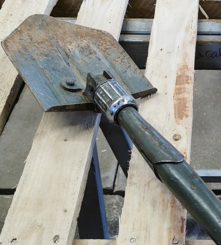 Aérogommage d'une pelle US